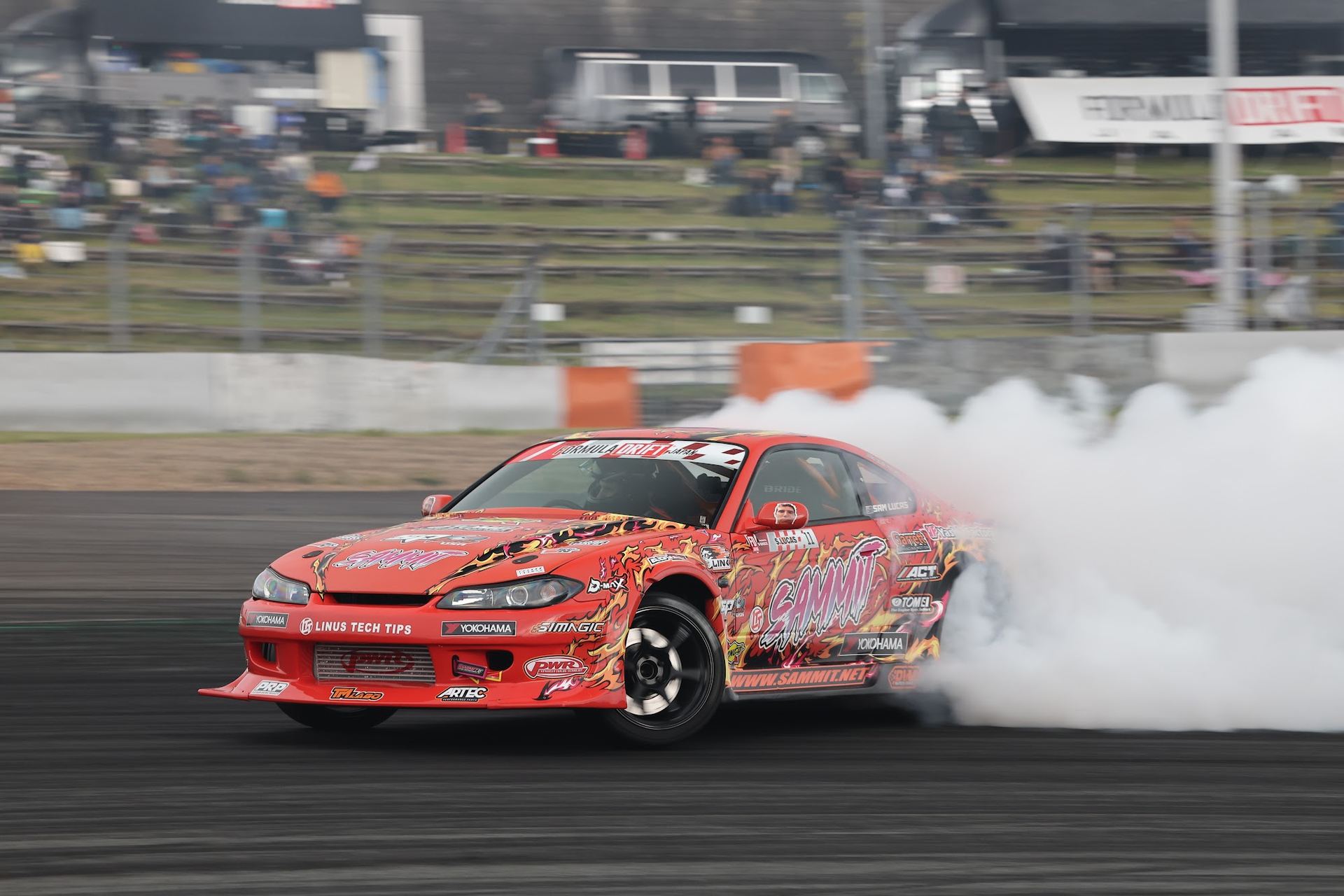 SAMMIT's #11 S15 mid-drift at Formula Drift Japan